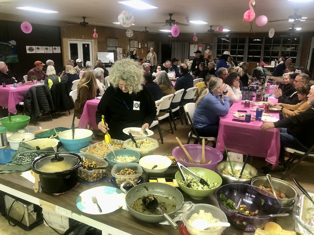 Pot luck dinner in Lodge